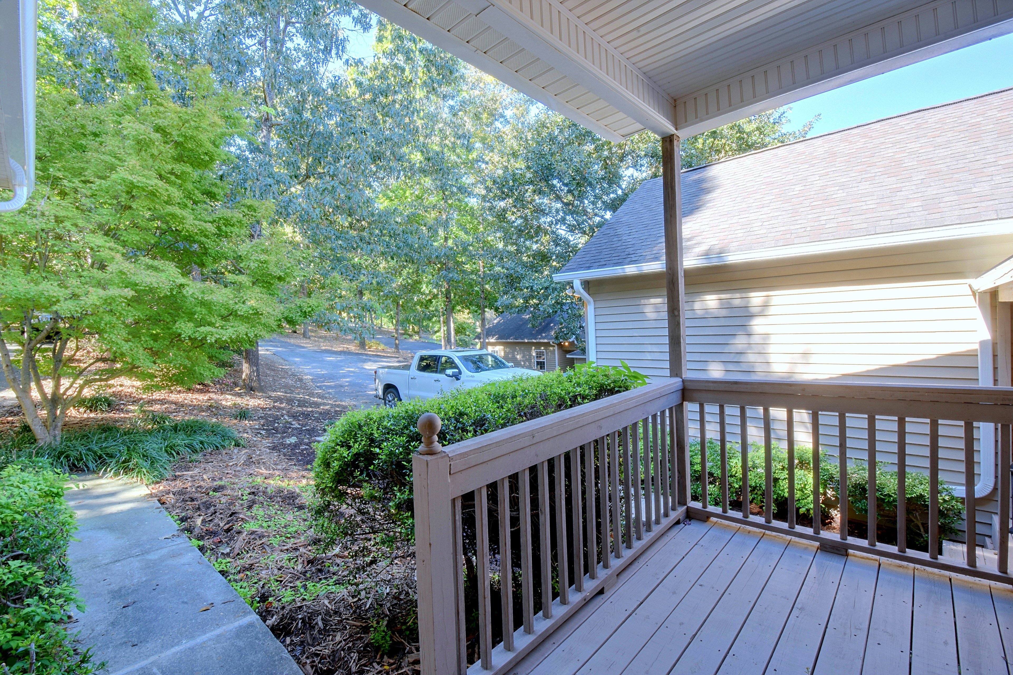 View looking out from the front entryway towards the driveway.