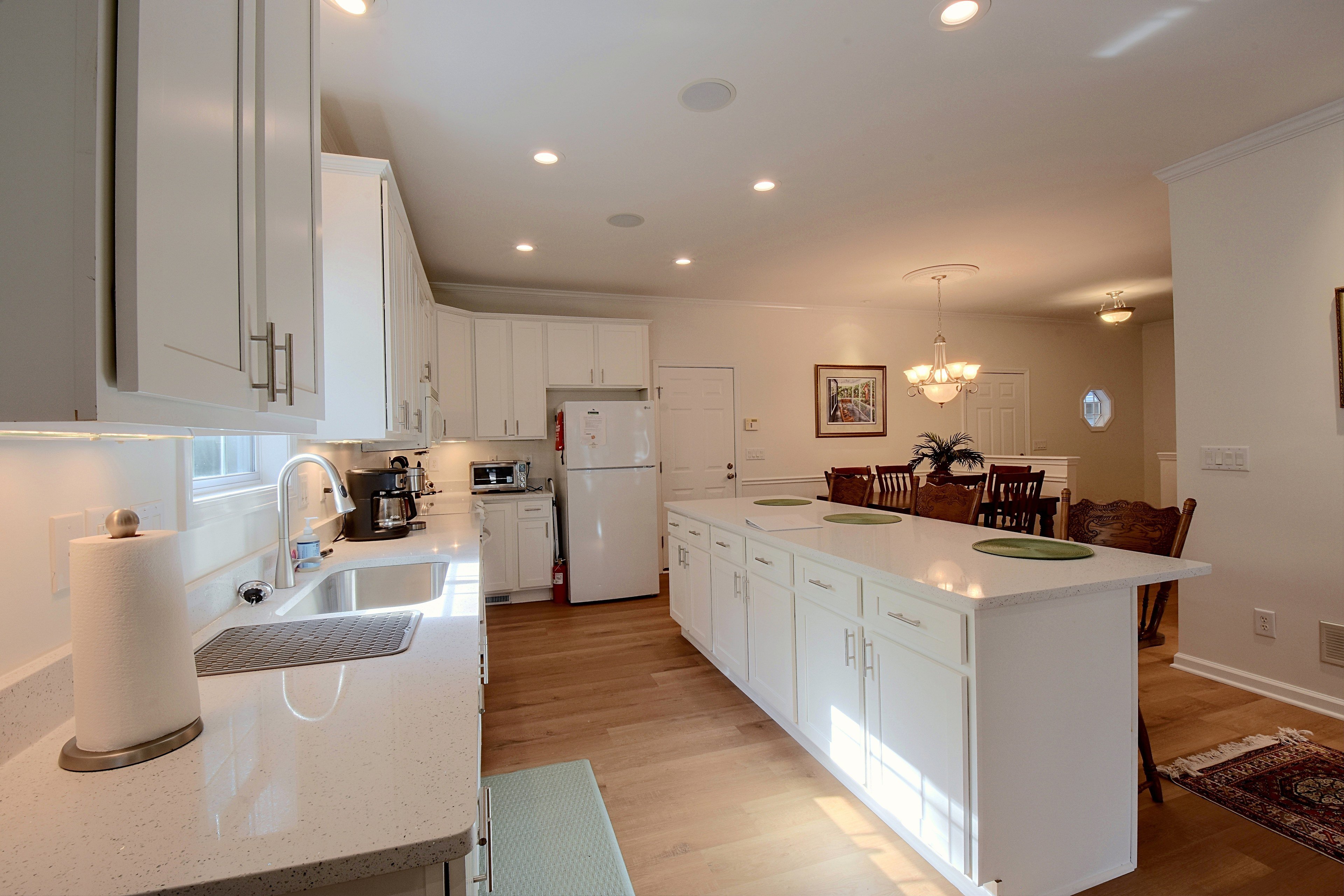 Kitchen island view looking across toward dining space.