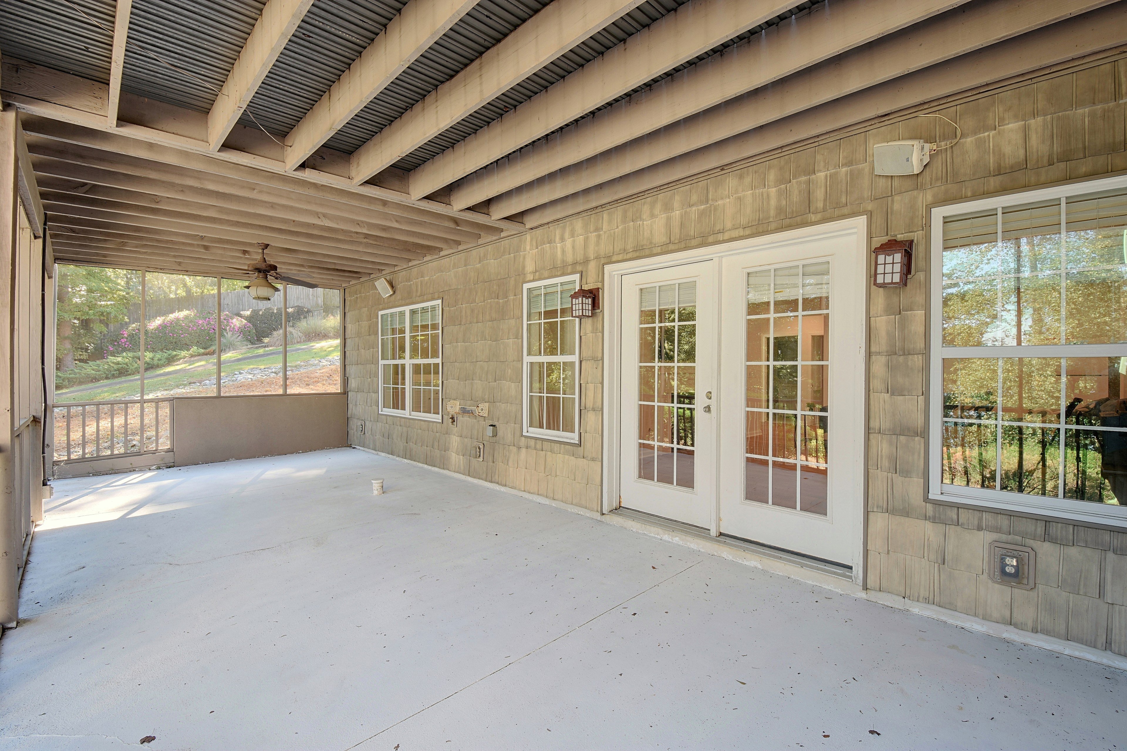 Lower screened porch looking toward french doors into house.
