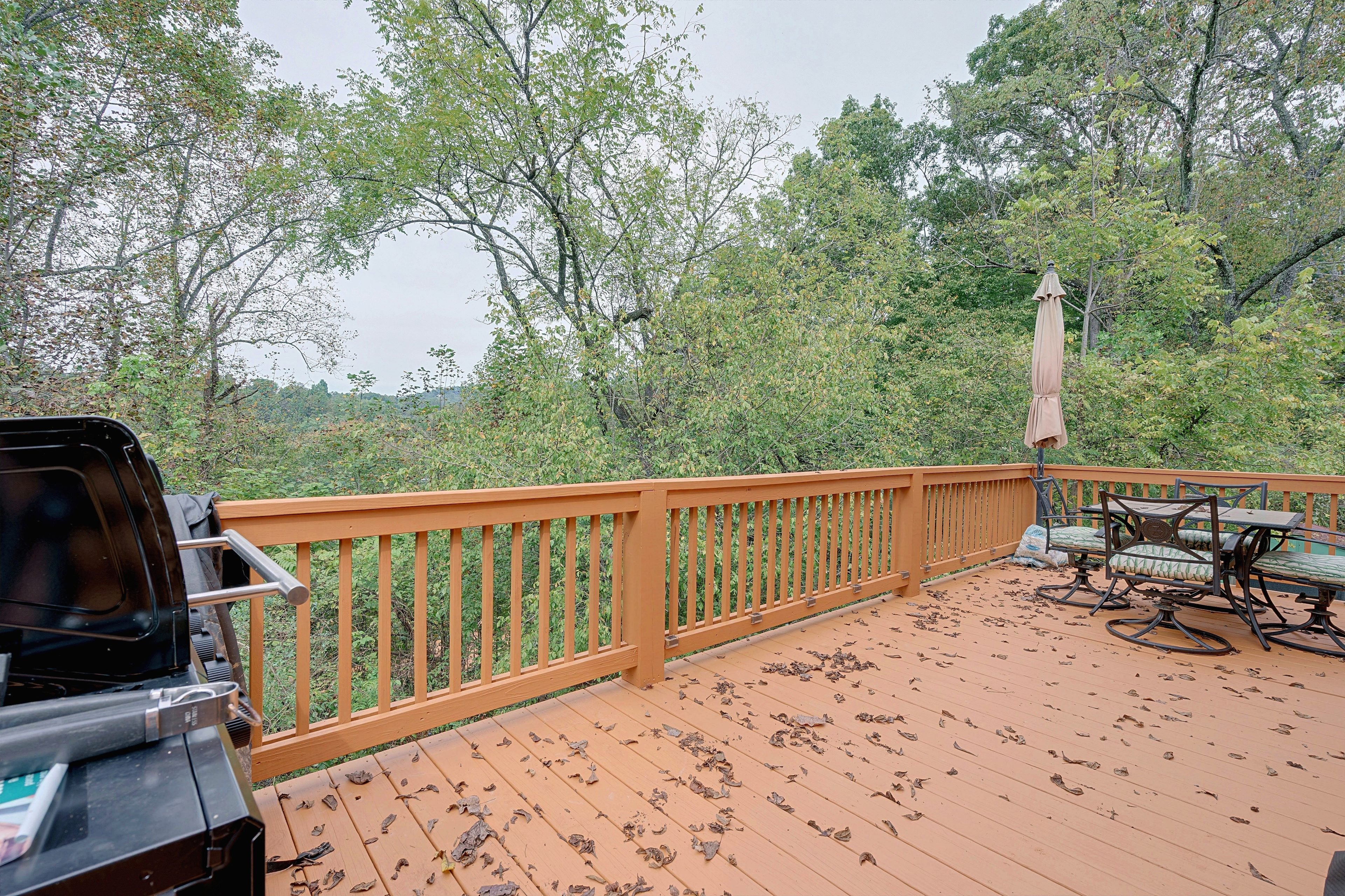 Furnished Deck | Tree-Lined Surroundings