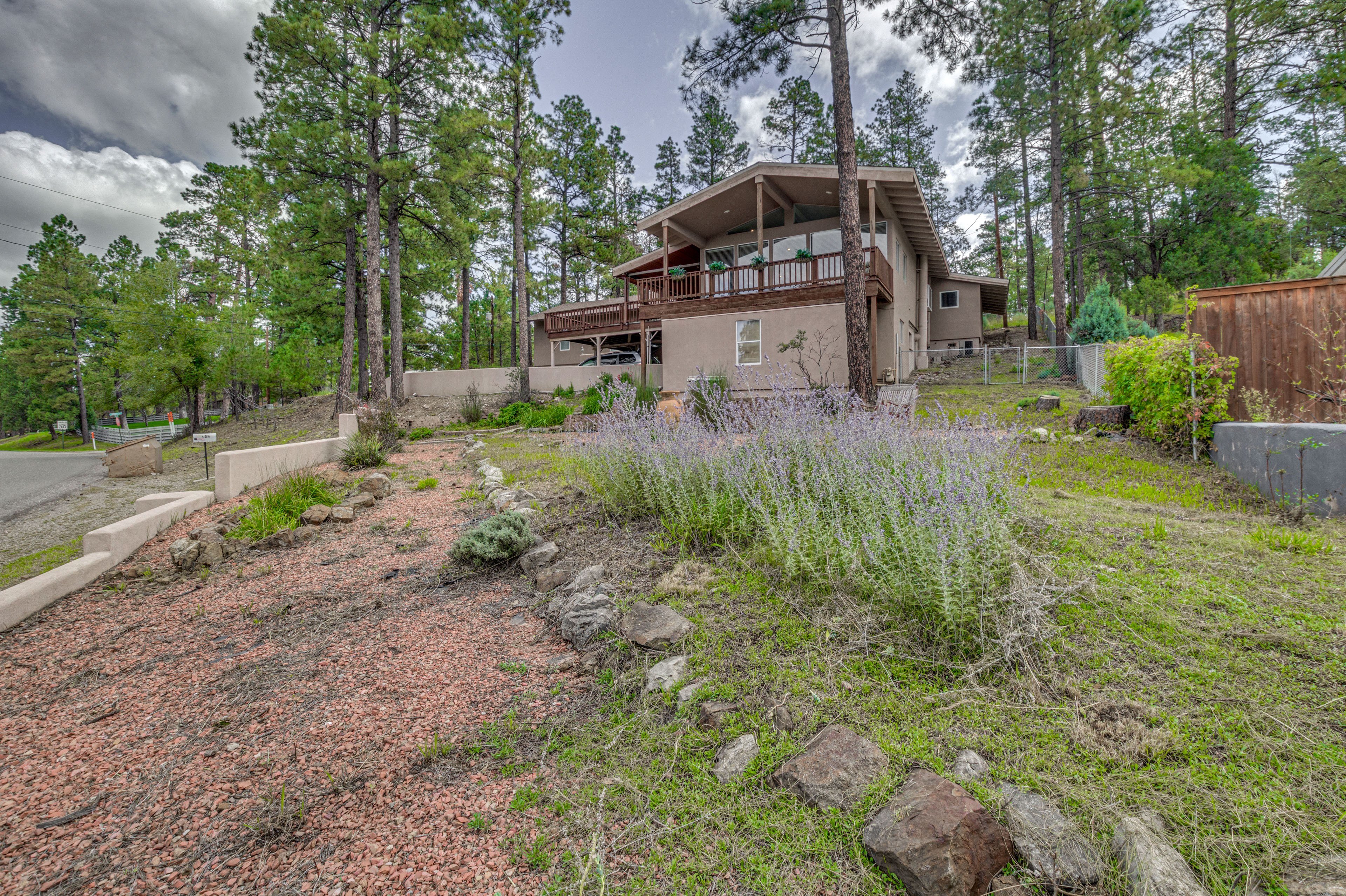 Exterior | 2-Story Home | Spacious Yard & Wraparound Deck