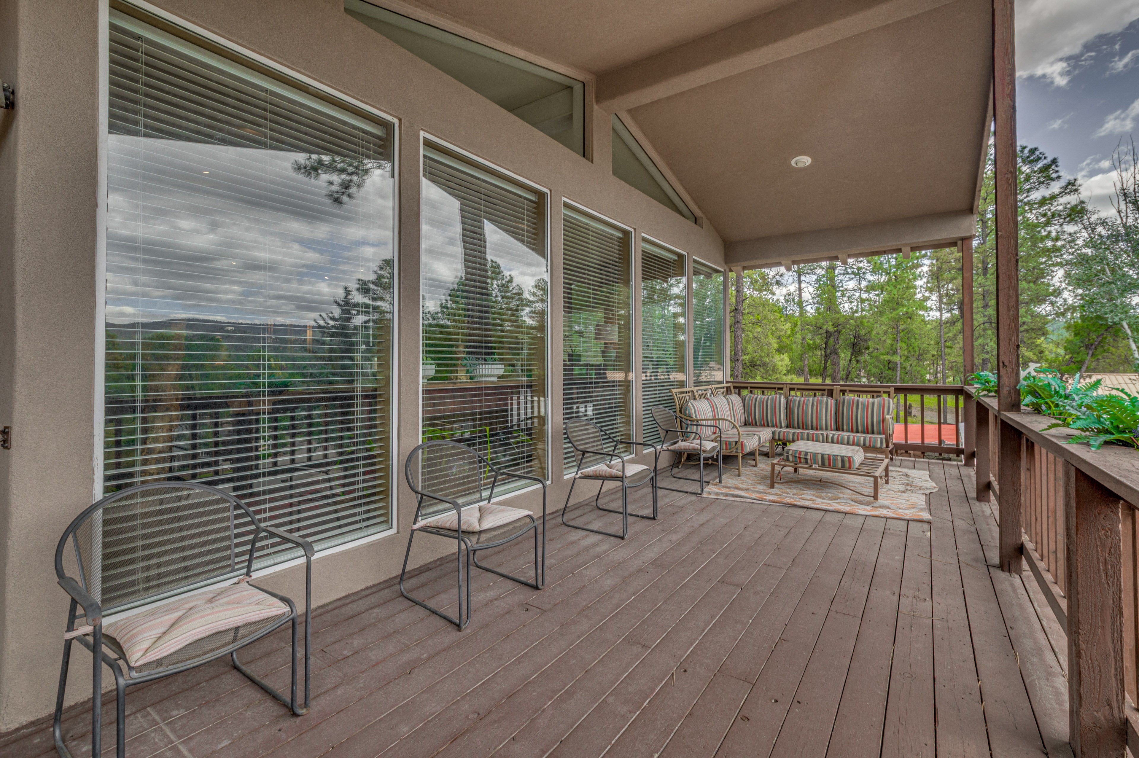 Wraparound Deck (Partially Covered) | Dining & Lounge Areas