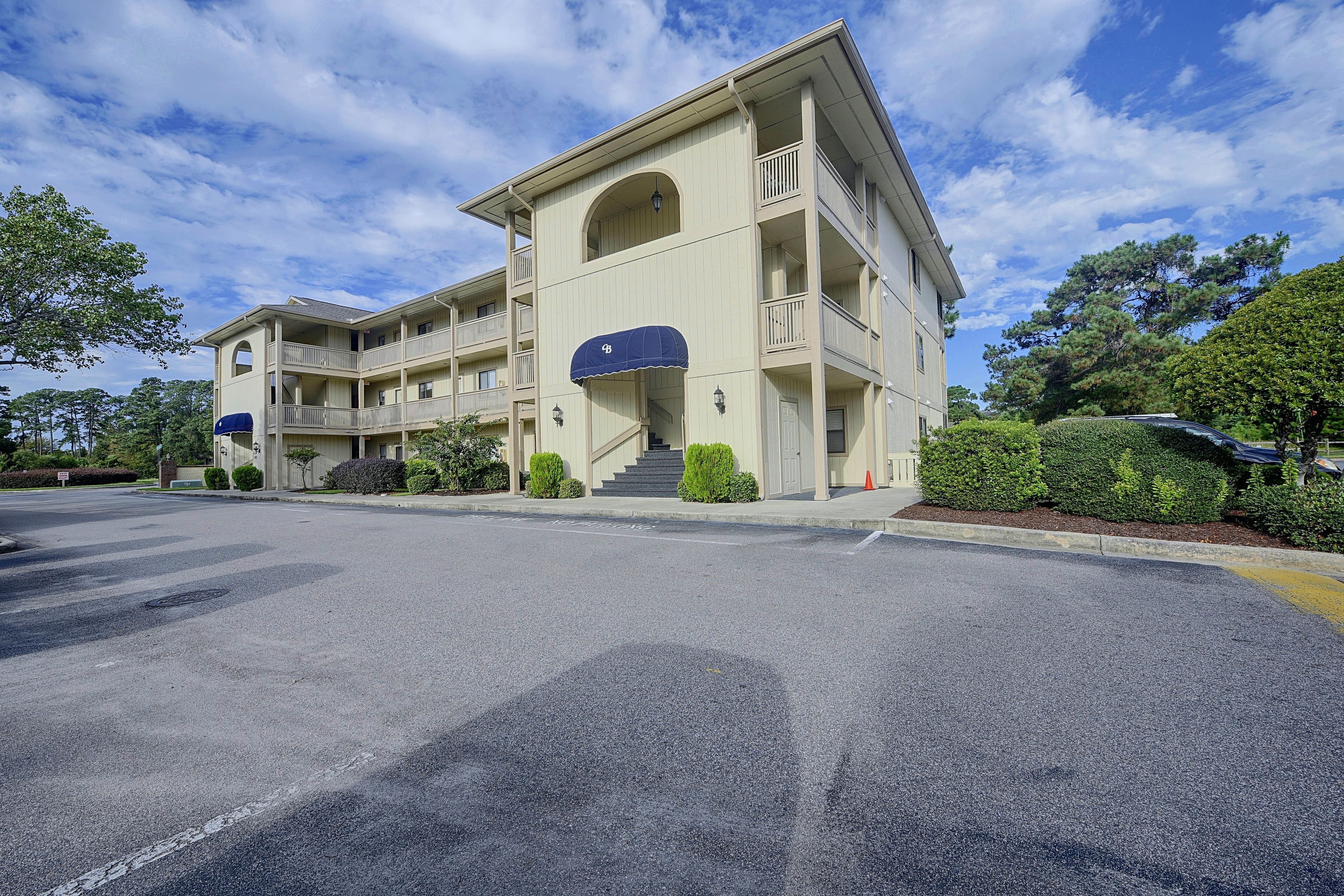Building Exterior | Open Community Parking Lot (2 Vehicles)